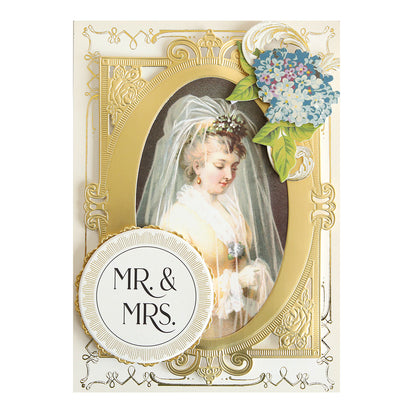 Marvelous Milestones Rub On Sentiments: Vintage-style wedding card with "MR. & MRS.", featuring a bride's portrait in a gold ornate frame and blue floral accents—ideal for handmade cards or memory-keeping projects.