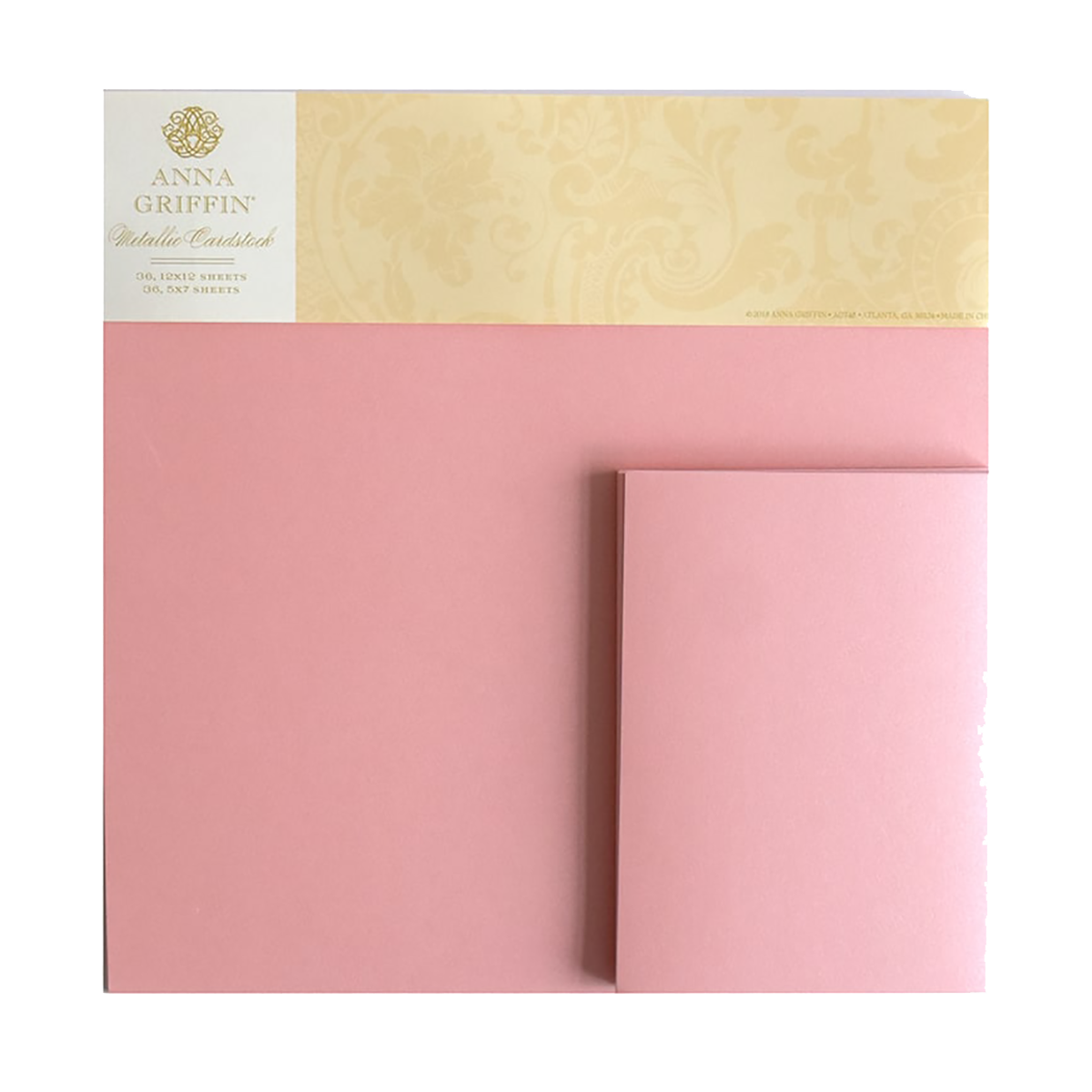 A bundle of Metallic Cardstock in Pearl Pink, 12x12 sheets, with a matching folded card displayed against a white background.