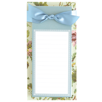 The Francesca Hostess Gift Set includes a floral list pad with blue border, blank lined sheets, and a blue satin ribbon bow—perfect as a charming hostess gift. Complete the set with a matching pen for extra elegance.