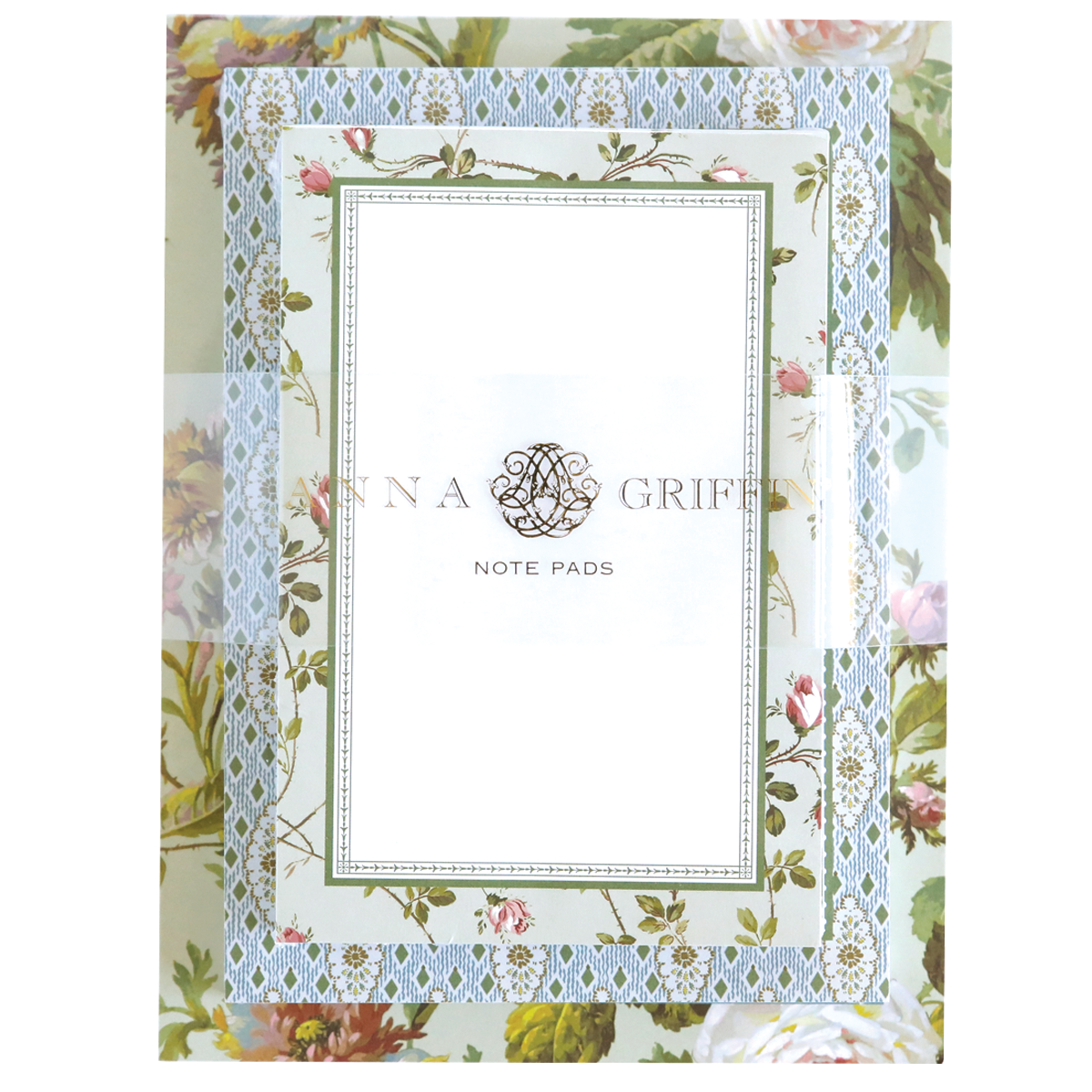 The Francesca Note Pad Set features a large floral pattern with "Anna Griffin" inscribed. The border has blue geometric designs mingled with blossoms and includes 300 sheets for notes and musings.