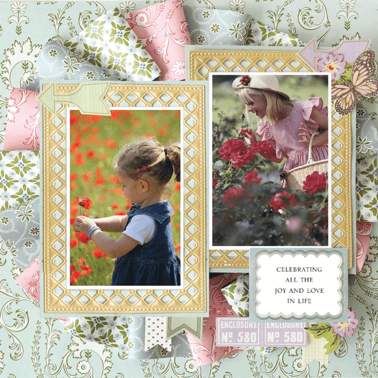 Two young girls pick red flowers in a garden, framed by floral patterns on the 12x12 Scrapbook Page Charlie Paper Ribbon Wreath Right, which reads, "Celebrating all the joy and love in life.