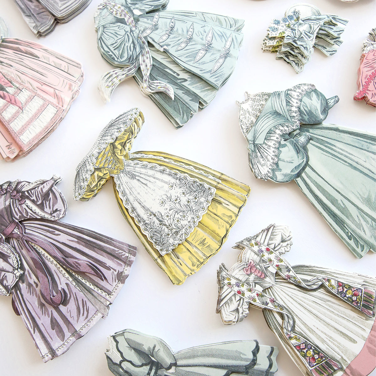 A dimension of Paper Fashion Stickers showcasing various fashion styles.