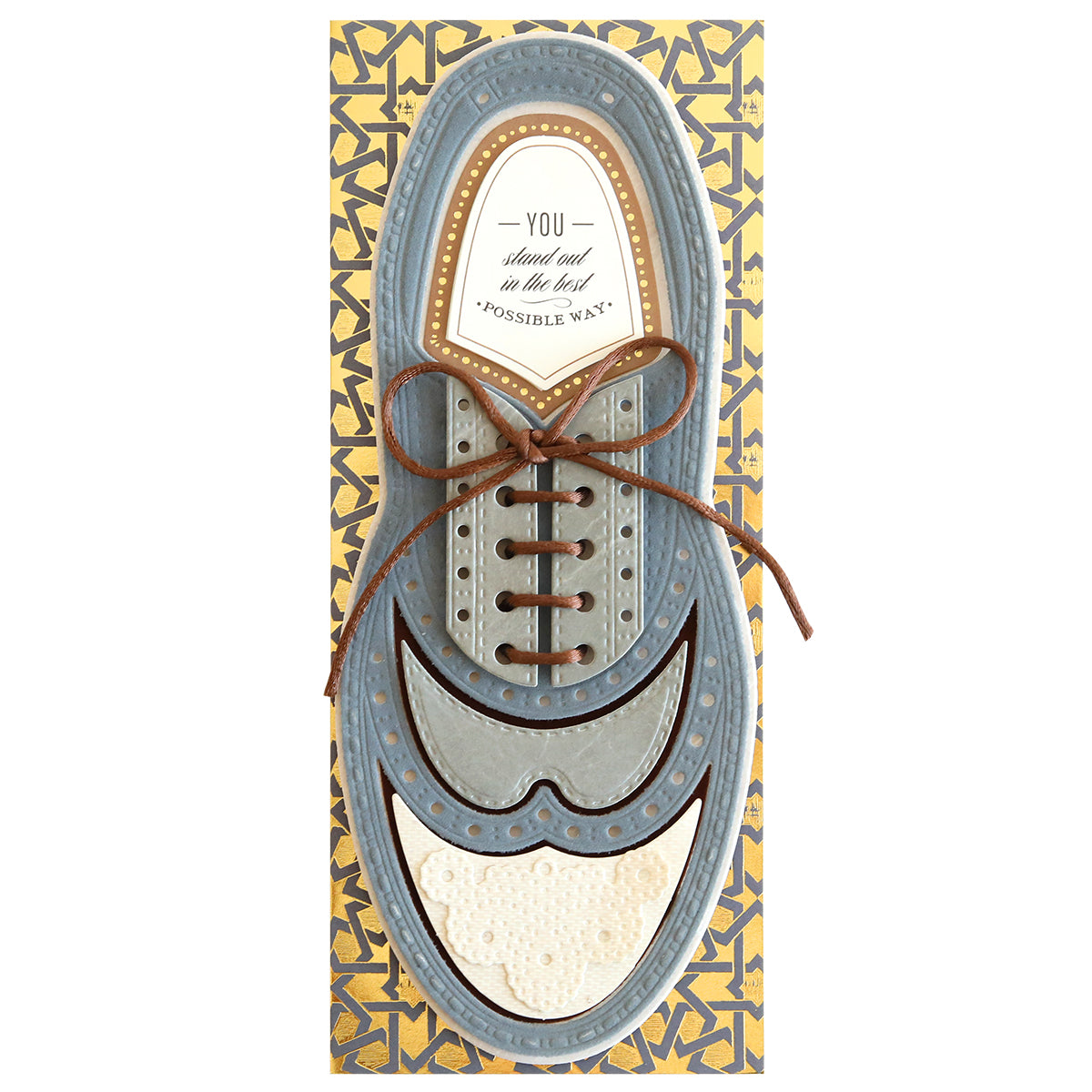 Greeting card designed as a blue and brown shoe with text inside that reads "You stand out in the best possible way," encased in a decorative patterned border from Paper Wingtips Finishing School Craft Box.