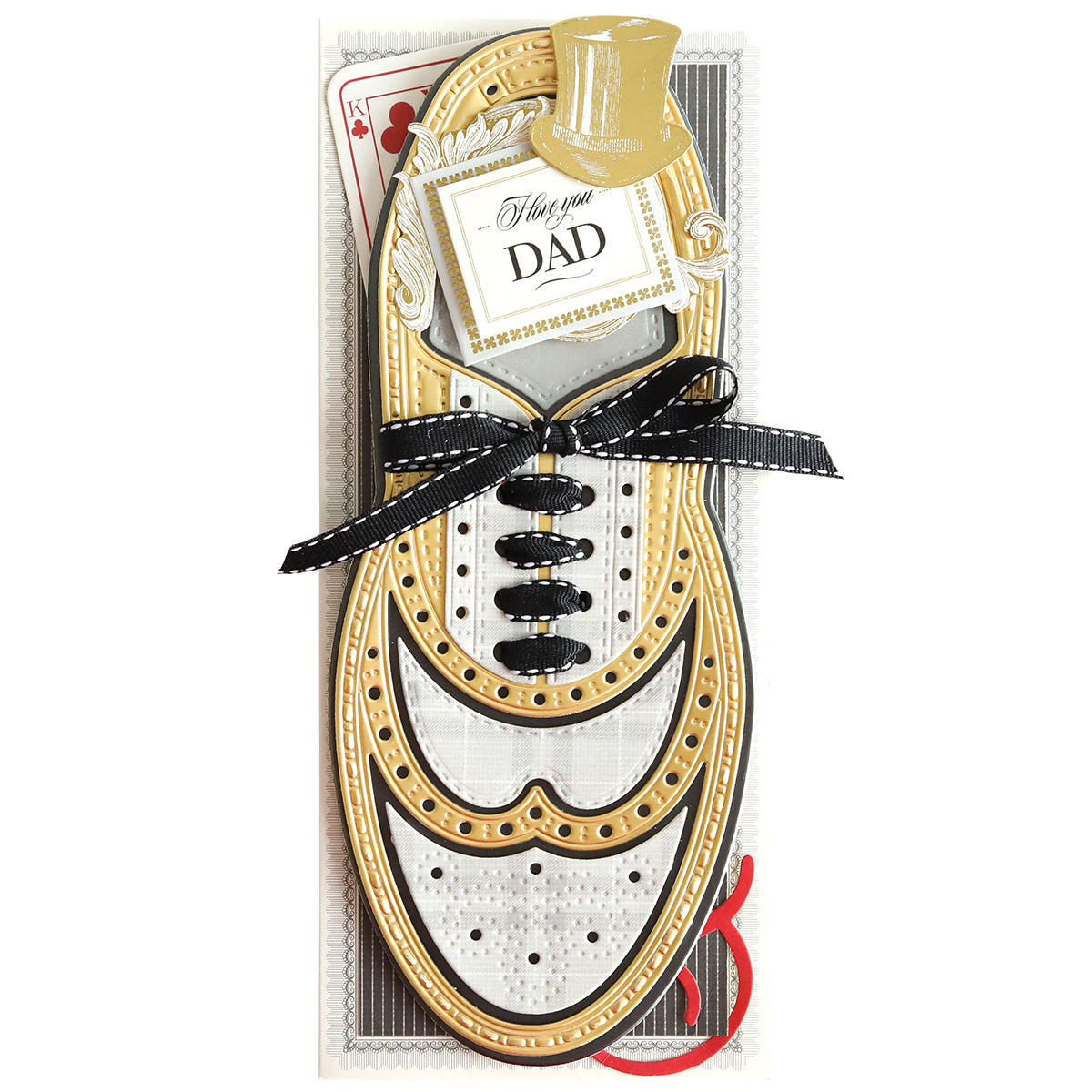 Image of a Father's Day card designed to look like paper wingtip shoes, adorned with a black ribbon and a tag reading "for you DAD." A playing card is partially visible in the background, making it perfect for any shoe lover. Product Name: Paper Wingtips Dies