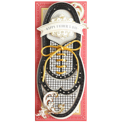 A Father's Day card featuring a shoe design with a black and white houndstooth pattern and a gold shoelace, perfect for any shoe lover, adorned with a "Paper Wingtips Dies" banner at the top.