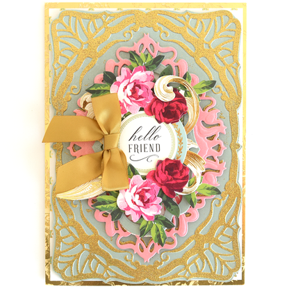 Greeting card made from Perfect Palette Flocked and Printed Cardstock, featuring gold embossed patterns, a gold ribbon bow, and pink and red flowers around a “hello FRIEND” circle. Ideal for cardmaking enthusiasts.