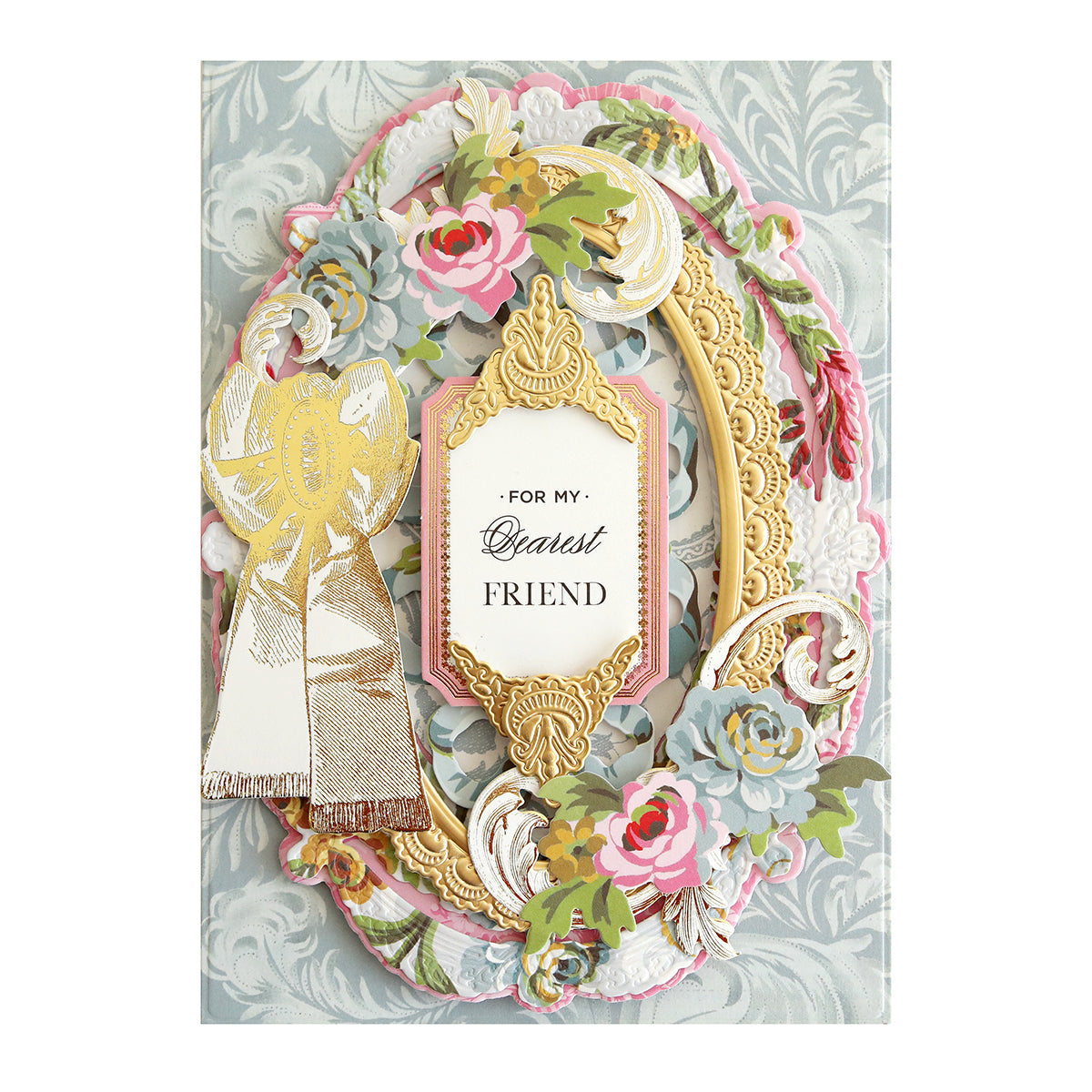 A decorative greeting card with a gold frame, floral accents, and the text "For My Dearest Friend" in the center, perfect for adding to your collection of Phoebe Papers and Embellishments.