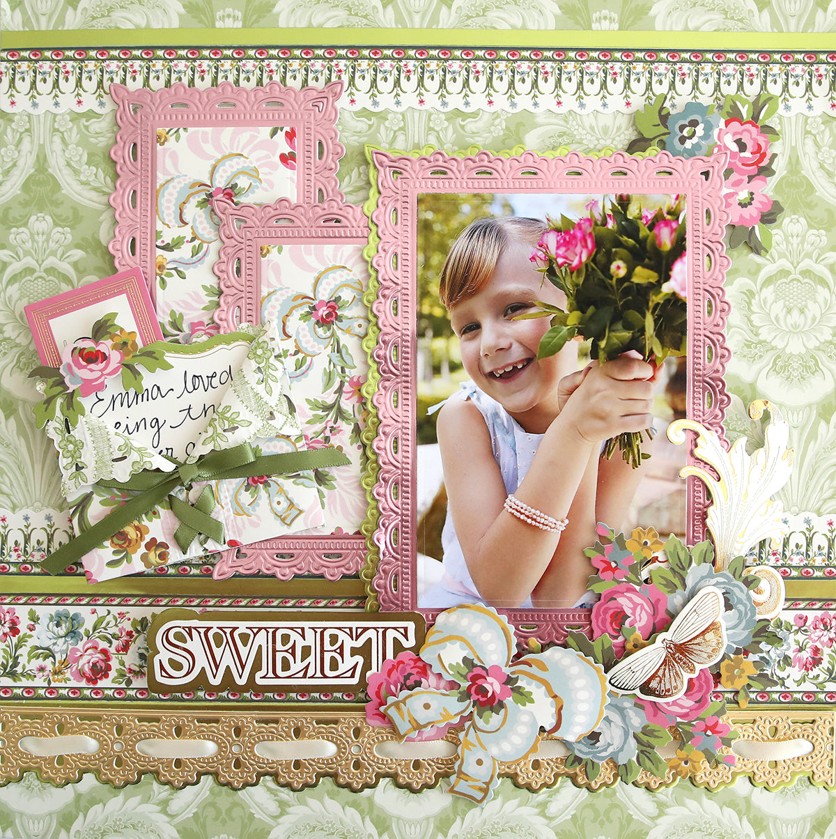 A decorative scrapbook page featuring a smiling child holding a bouquet of flowers, surrounded by pink frames, floral patterns, and a "SWEET" label at the bottom, embellished with Phoebe Papers and Embellishments perfect for your collection of scrapbook supplies.