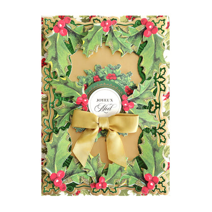 A Retro Holly Sticker Library christmas card adorned with holly berries, a bow, and 3D stickers.