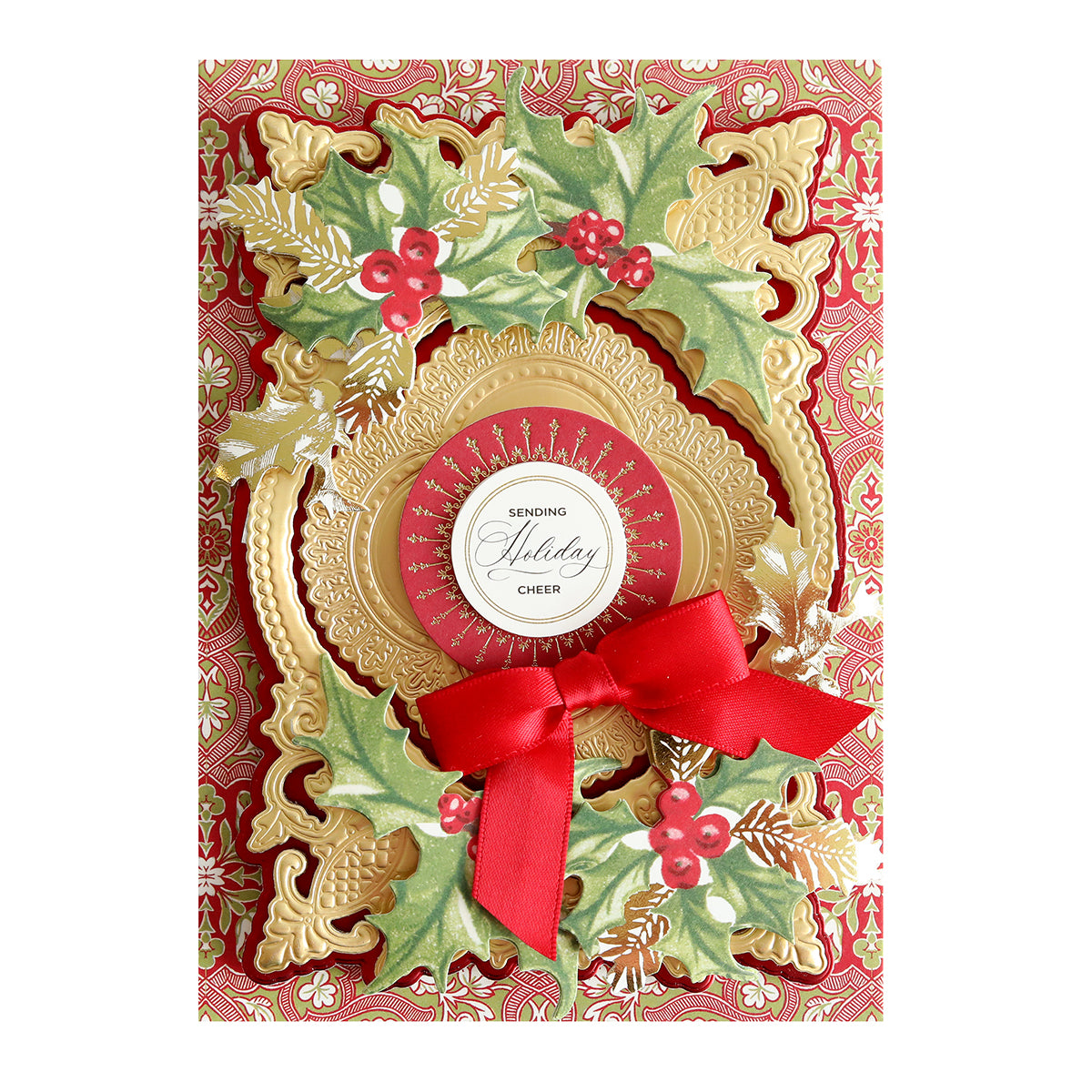 A seasonal craft project featuring a Christmas card adorned with a red ribbon and accompanied by 3D stickers and the Retro Holly Sticker Library.