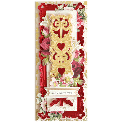 A Ribbon of Hearts Slimline Dies adorned with love-filled red and gold hearts.