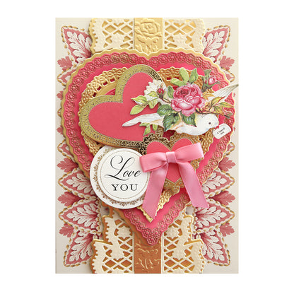 A valentine's day card with a pink heart and bow featuring Romantic Stickers and Sentiments.