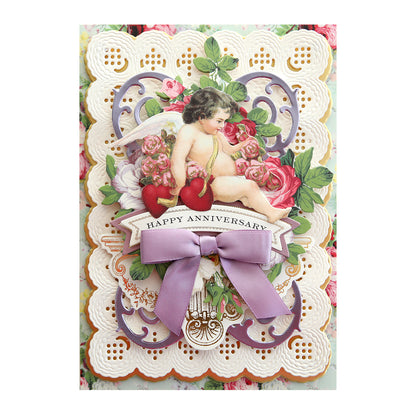 A card with an image of a cupid and flowers, perfect for the Romantic Stickers and Sentiments.