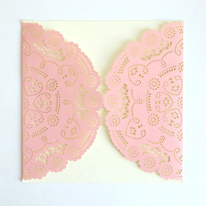 The Pink Lace Diecut Gatefold 10 pack includes cream square cards with two semi-circular pink lace gatefolds on each side, ideal for creating elegant wedding invitations.