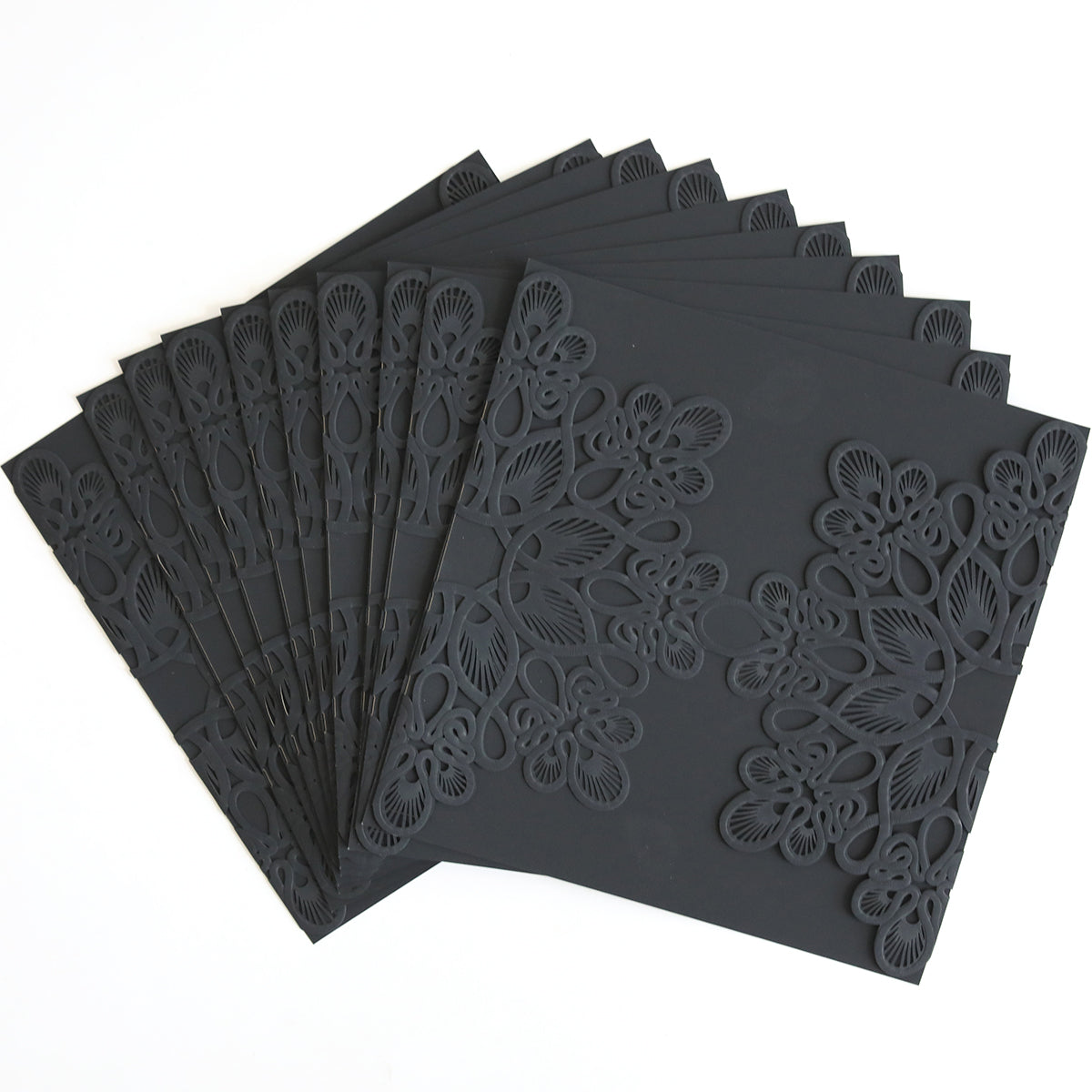 A pack of Black Triangle Lace Band cards, featuring intricate laser-cut patterns, ideal for custom or elegant wedding invitations, fanned out on a white surface.