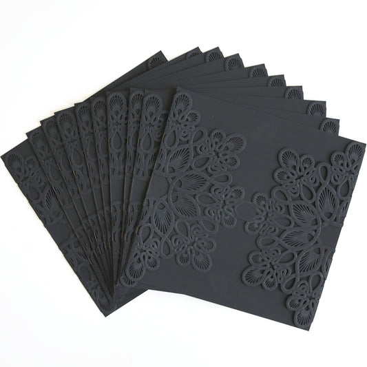 A pack of Black Triangle Lace Band cards, featuring intricate laser-cut patterns, ideal for custom or elegant wedding invitations, fanned out on a white surface.