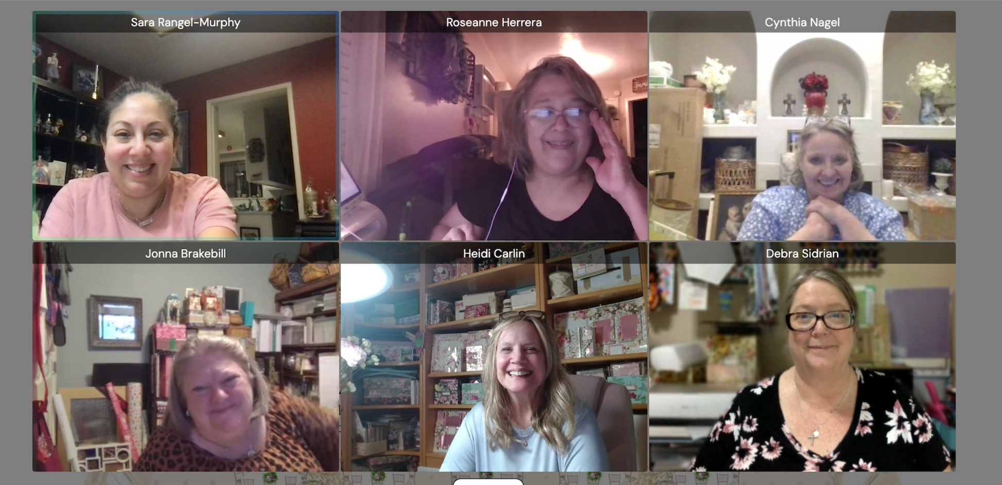 Six women smile and chat from their own spaces in a video call, connecting through Anna Griffin | Create Fall 2026 craft classes and embracing a creative community.