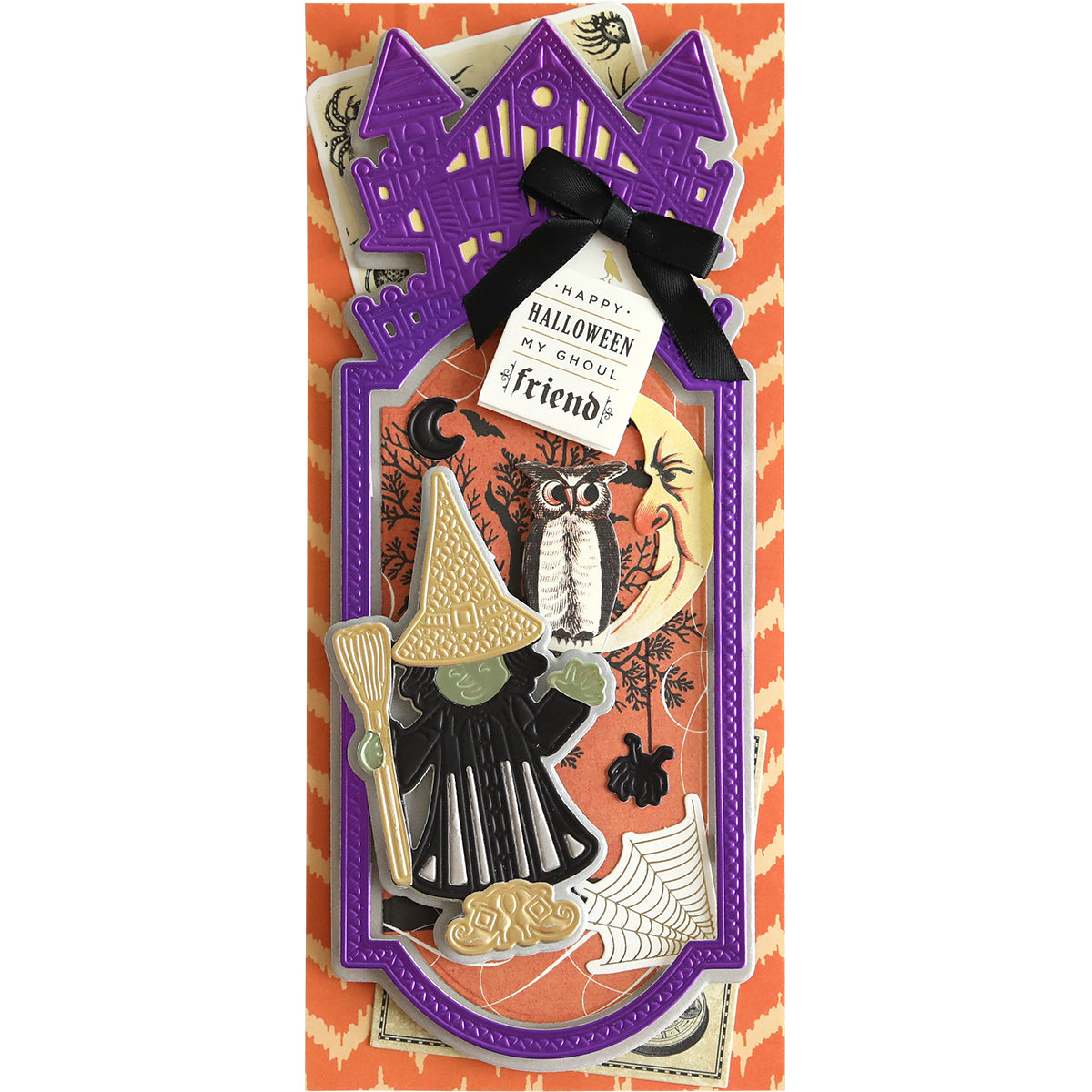 A Halloween-themed card created using Slimline Witch Dies, featuring a witch, an owl, a haunted mansion, spiders, and a "Happy Halloween my ghoul friends" message on an orange and purple background adorned with web and broomstick designs.