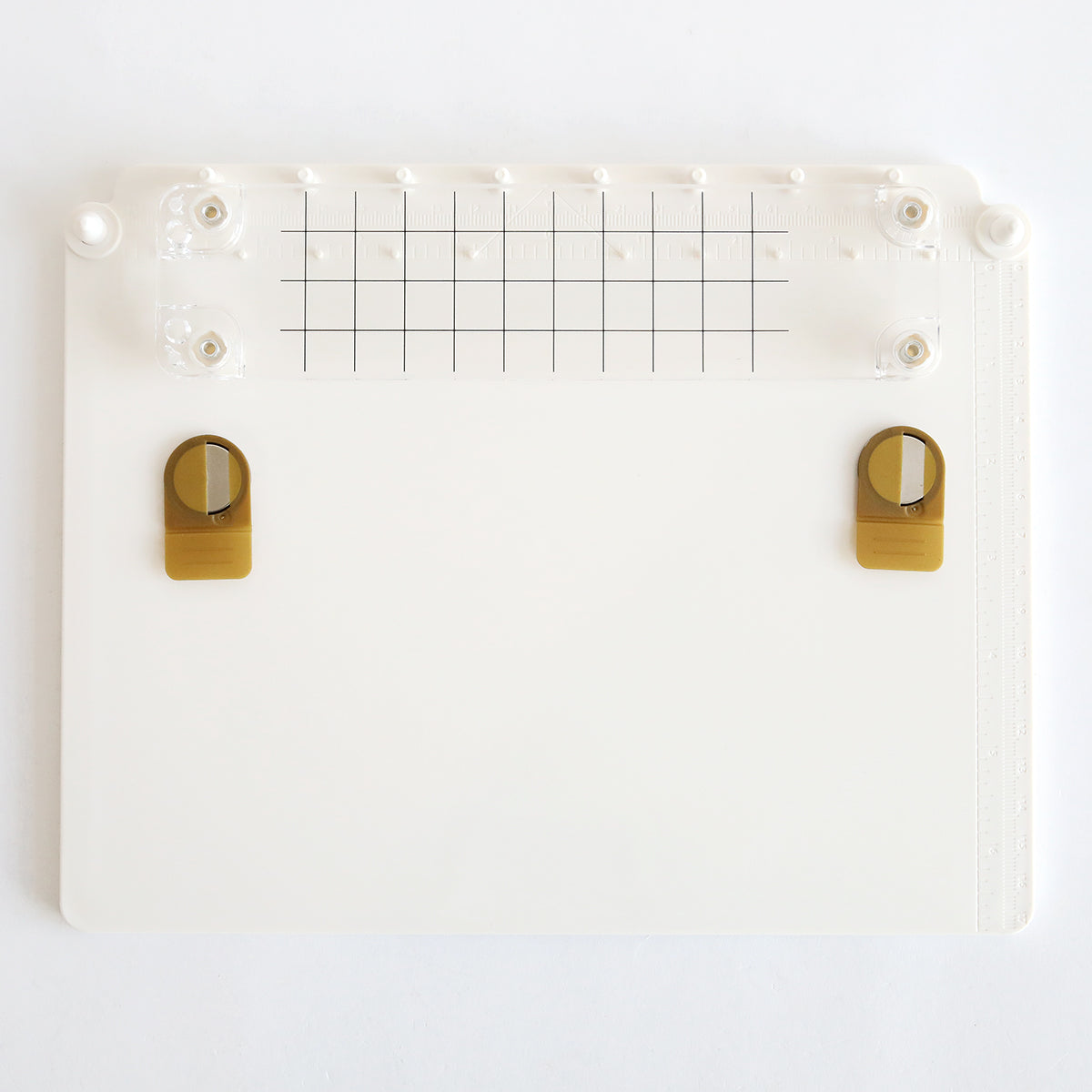 Modified Description: A white board with Stamp Platform and Alignment Tool cling stamps attached to it.