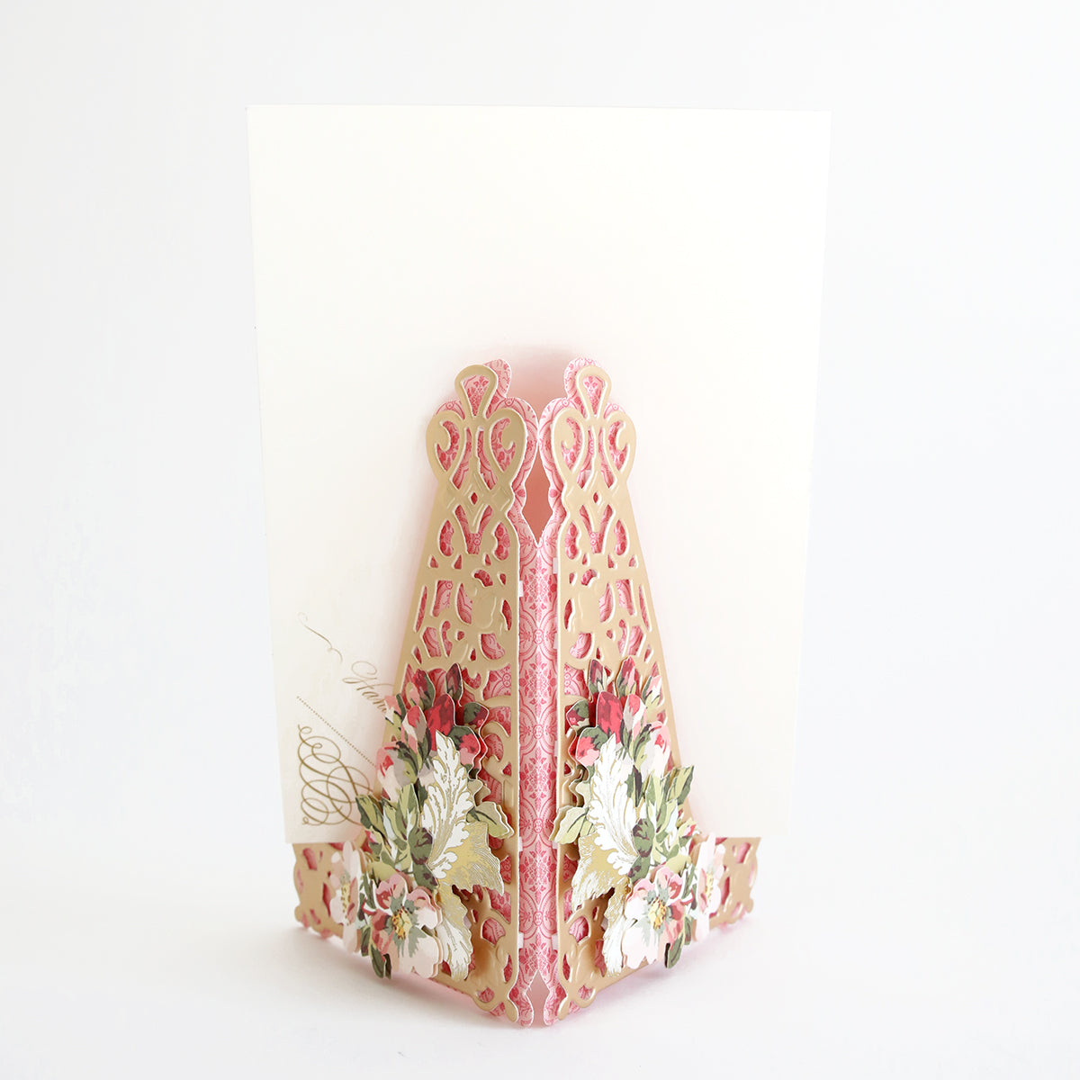 A pink and white card with delicate flowers on it, embellished with the Tall Card Stand Dies.