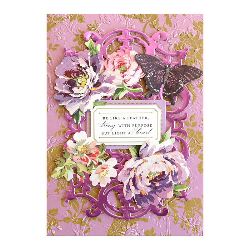 A handmade card featuring Thankful Sentiments and Floral Stickers, with purple floral accents and a central cutout frame decorated with layered paper flowers, a butterfly, and a sentiment.