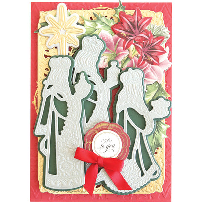 Christian-themed Christmas card featuring ornamental cutouts from the Three Wise Men 3D Dies, a Star of Wonder, floral decorations, and a "Joy to You" message framed by a bow.