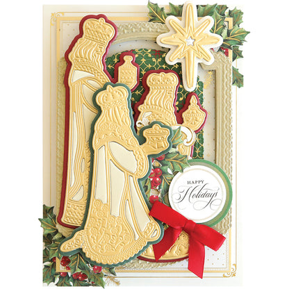 Holiday card featuring the Three Wise Men 3D Dies with gifts, gold and red accents, holly leaves, and a "Happy Holidays" silver and green emblem with a red bow. This festive Christmas card also includes the Star of Wonder to evoke a sense of the season's magic.