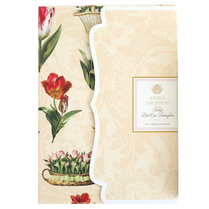 A notebook embellished with Tulip Rub On Transfers of tulips and flowers, ideal for crafting.