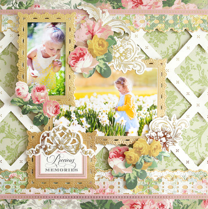 A scrapbook page with two photos of a young child in a field of flowers, surrounded by floral decorations and lace patterns. Virginia Papers and Embellishments accent the design, while a plaque reads "Precious Memories.