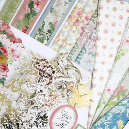 Various Virginia Papers and Embellishments are spread out in an overlapping arrangement.