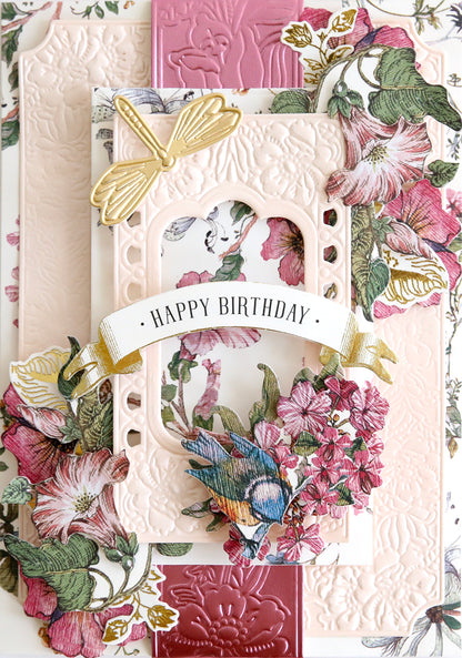 Handcrafted birthday card adorned with 3D Wildflower Meadow Frame and Border Dies and a "happy birthday" inscription.