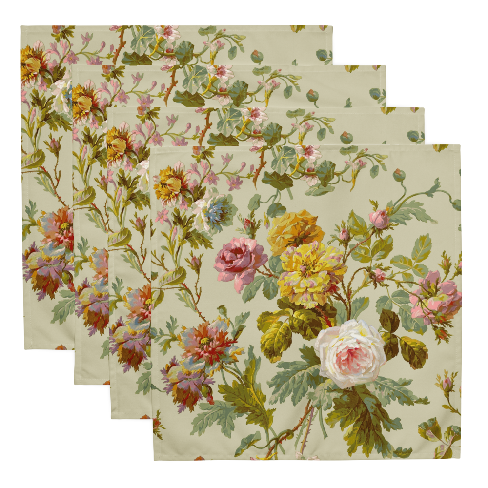 The Cloth Napkin Set of 4 features floral-patterned fabric squares with roses and leaves on a light background. These soft, lightweight napkins add elegance to any dining experience when arranged in a slightly overlapping manner.