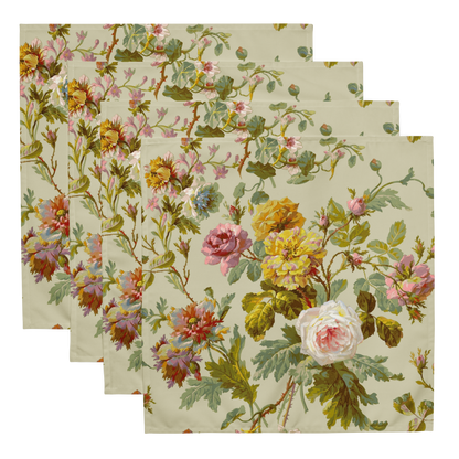 The Cloth Napkin Set of 4 features floral-patterned fabric squares with roses and leaves on a light background. These soft, lightweight napkins add elegance to any dining experience when arranged in a slightly overlapping manner.