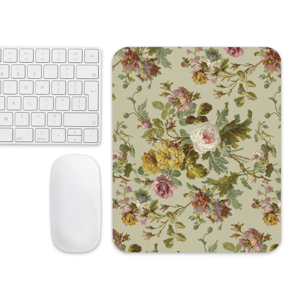 A keyboard and mouse are accompanied by the Mouse Pad, featuring roses and leaves on a light backdrop for supreme grip and smooth movement.