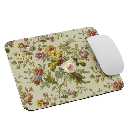 Floral mouse pad with supreme grip and easy mouse movement, featuring pink, yellow, and white flowers with green leaves. Comes with a stylish white computer mouse.