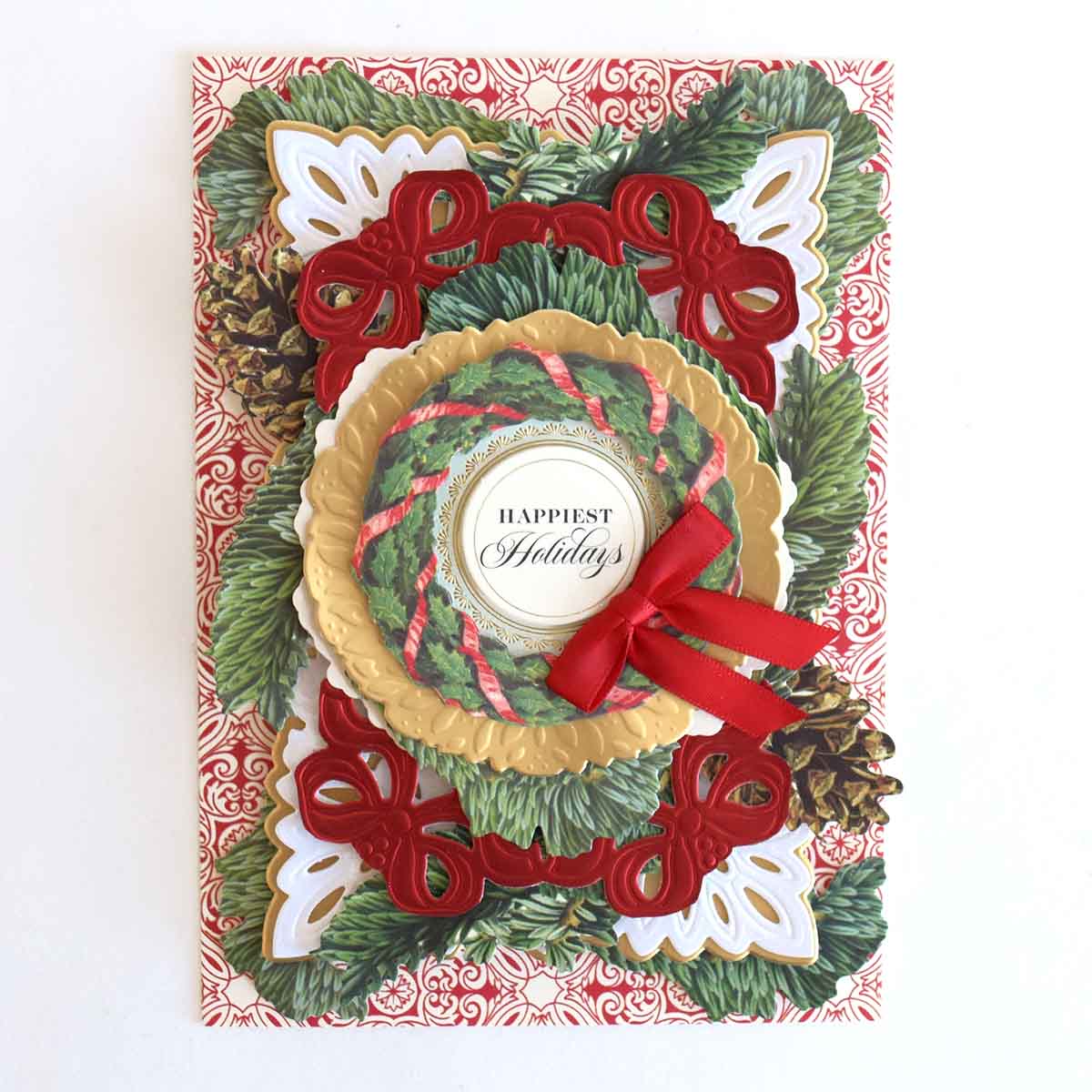 a handmade christmas card with a wreath.