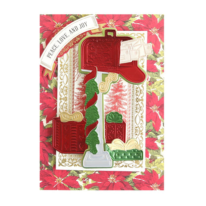 a Holiday Mailbox Die with letters and presents on a red and green floral background.