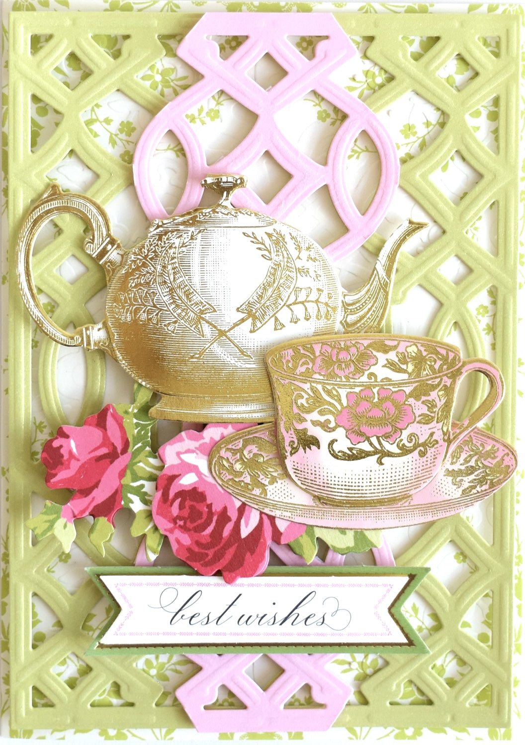 a card with a teapot, cup and saucer on it.