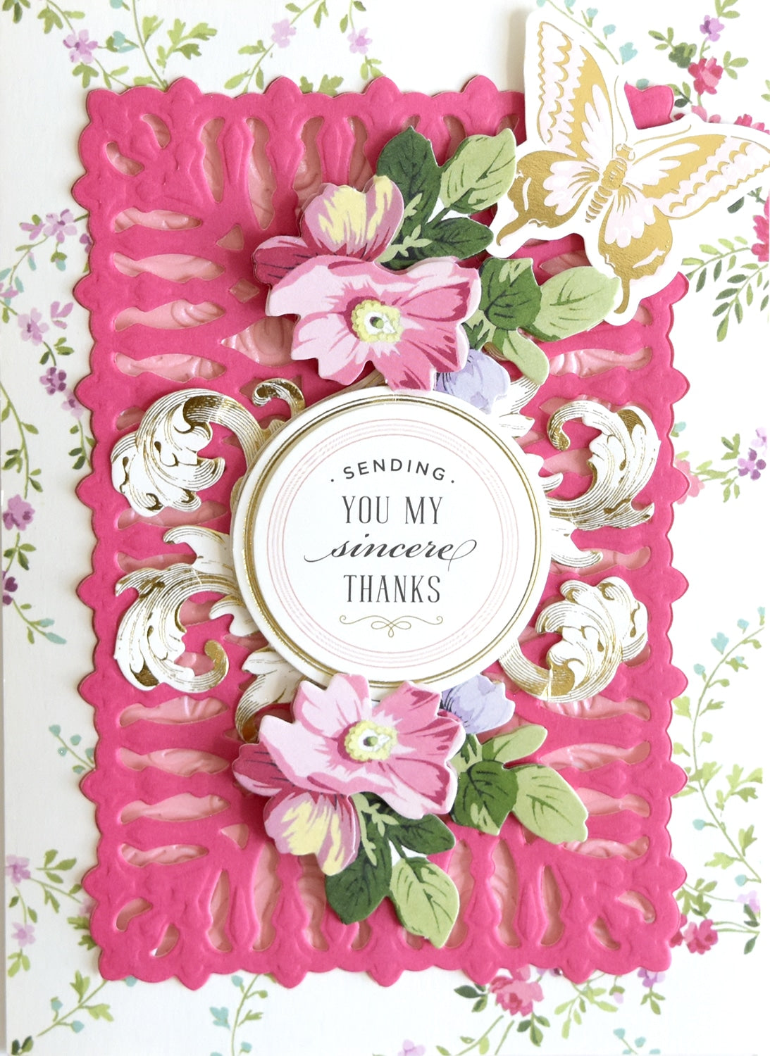 a handmade card with flowers on it.