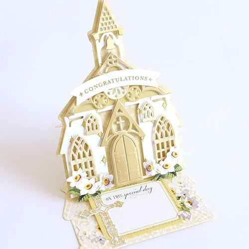 a card with a small church on it.