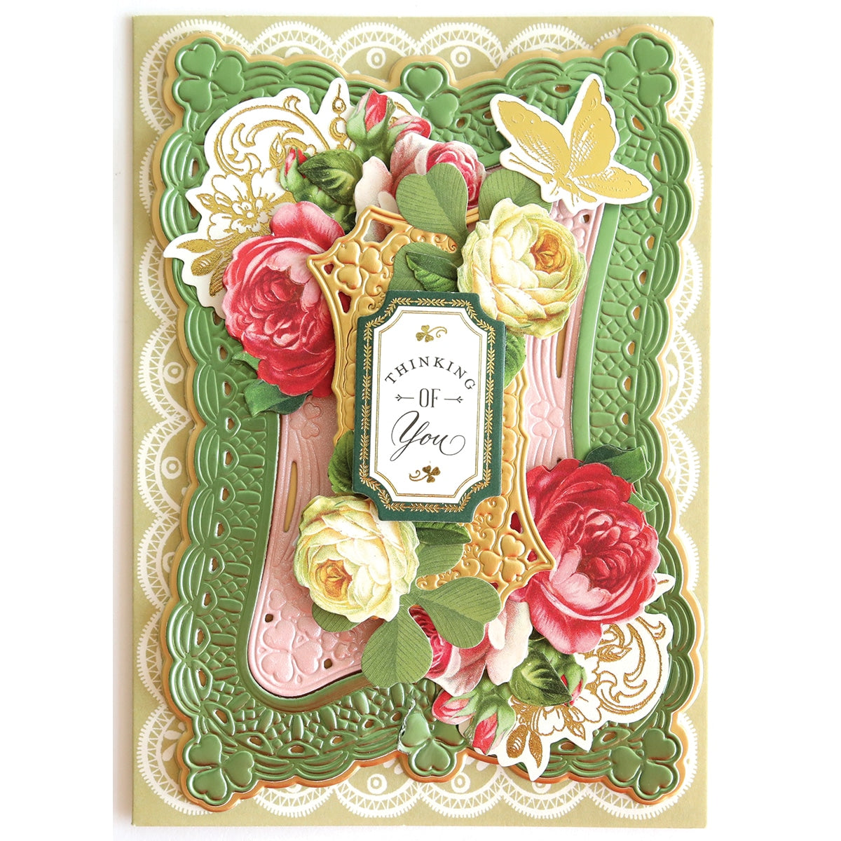 a card with flowers and lace on it.