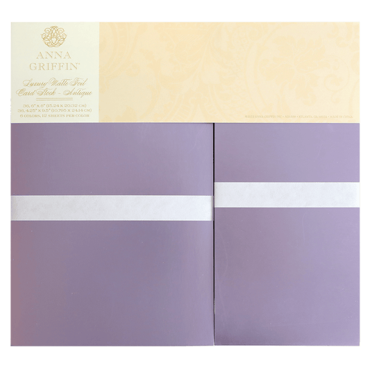 two purple and yellow envelopes with a white stripe.