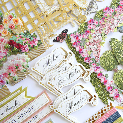 A table topped with lots of Flower Shop Embellishments.