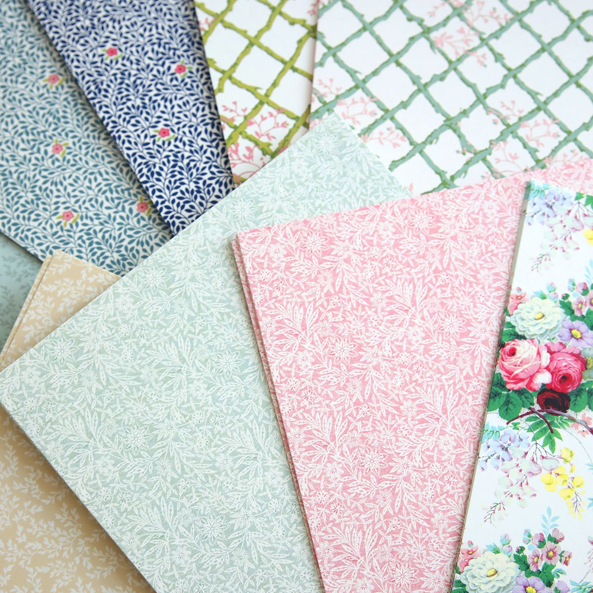 A close up of Flower Shop Double Sided Cardstock papers in many different colors.