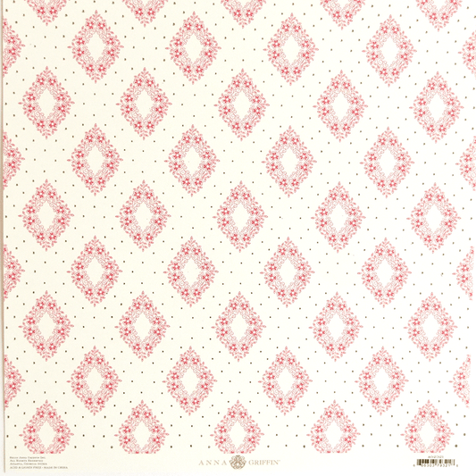 a red and white pattern on a sheet of paper.
