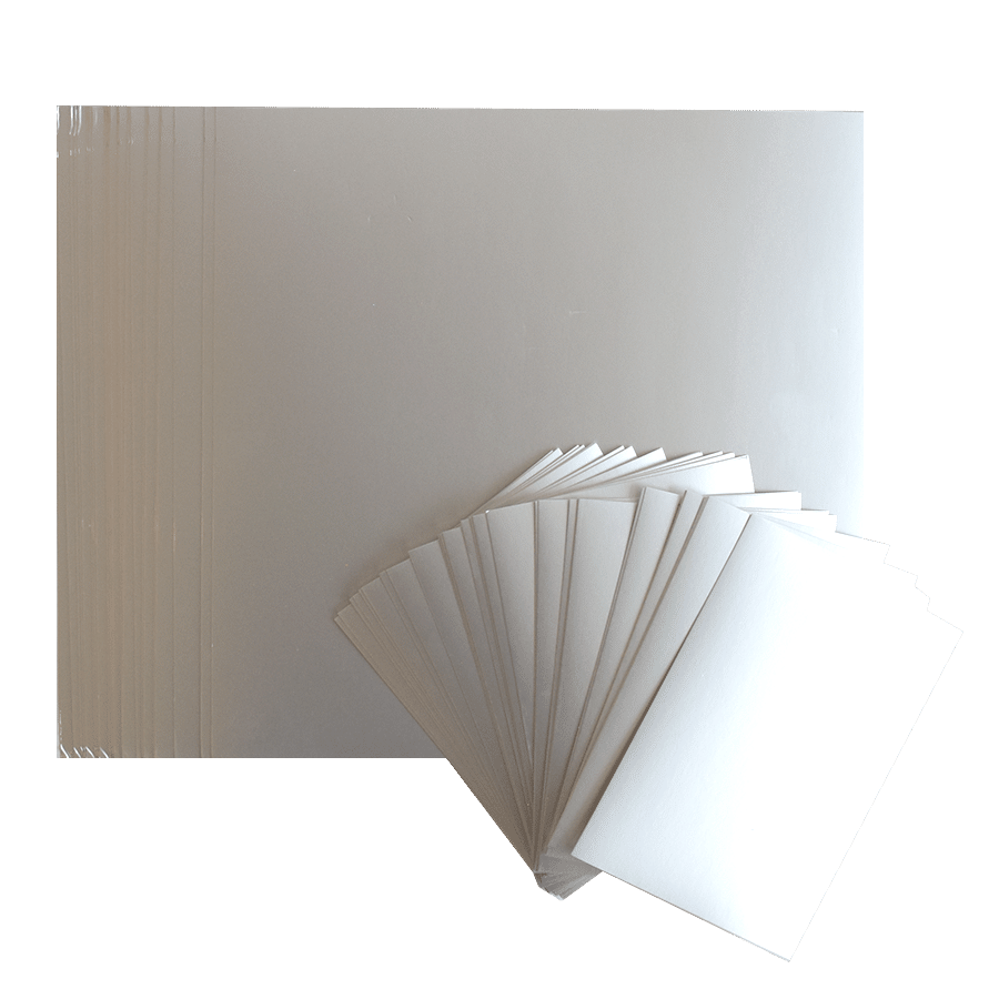 a stack of white cards sitting on top of each other.