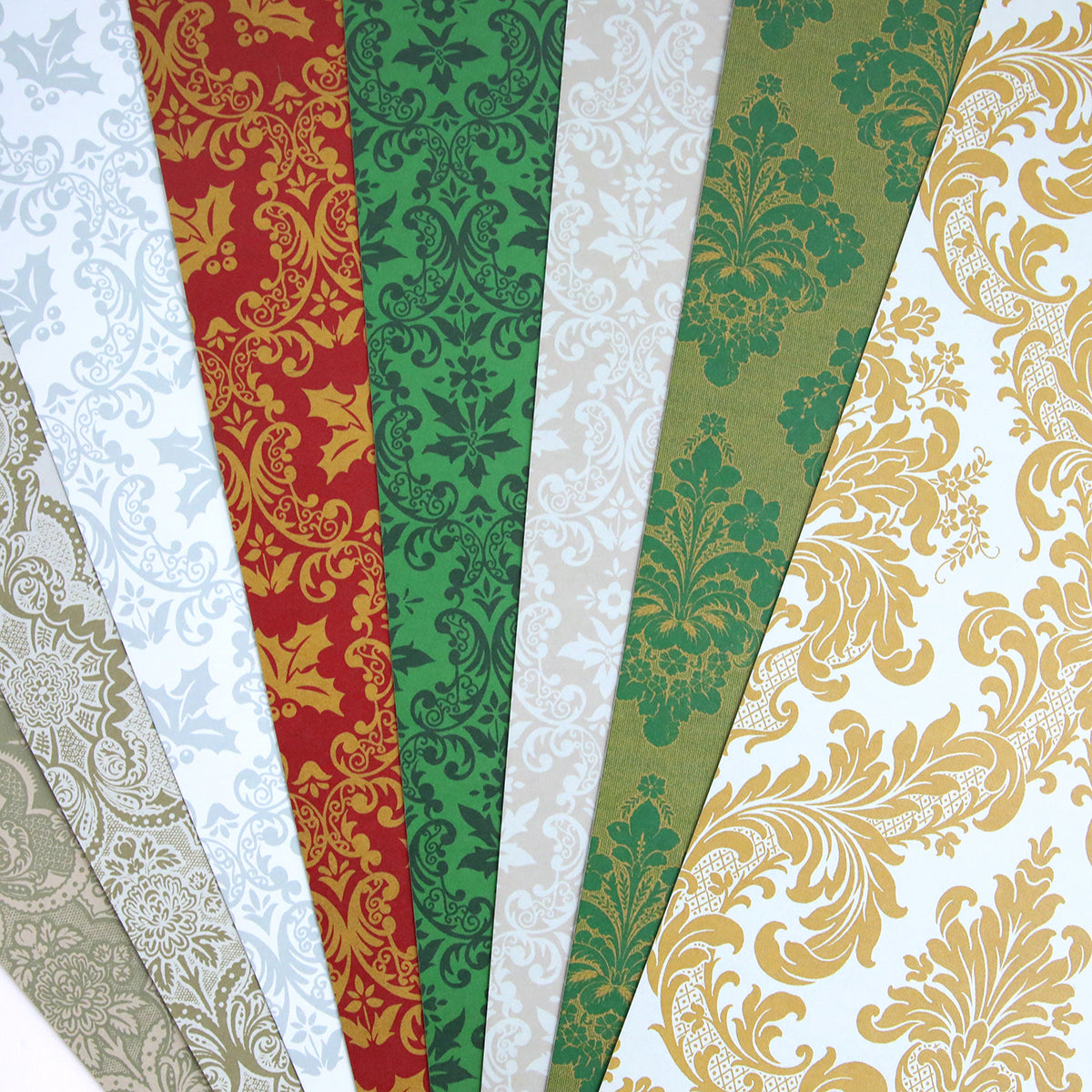 a group of different colored Christmas Damask 12x12 Cardstock papers.