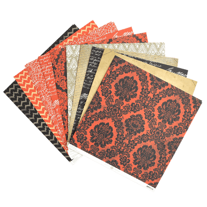A collection of Spooktacular Halloween 12x12 Cardstock with black and orange designs.