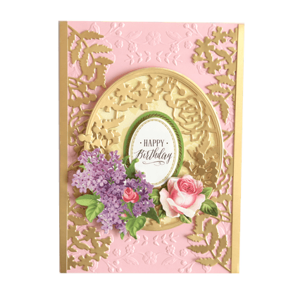a pink and gold birthday card with flowers.