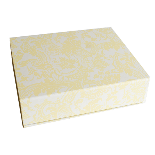 a yellow and white box with a pattern on it.